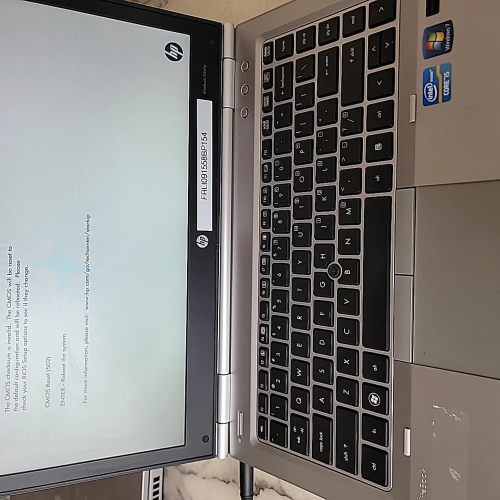 HP Silver and Black Laptop with Sleek Design and QWERTY Keyboard